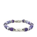 Purple and white striped howlite bracelet with silver laying on a white background